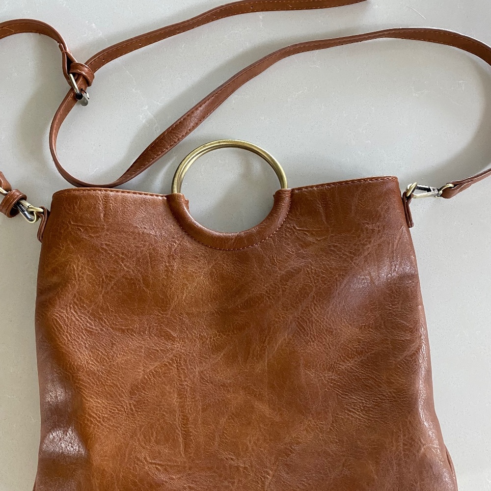 Leather purse with gold handle
